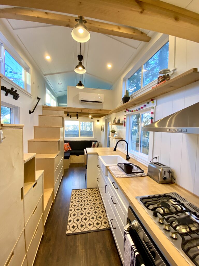 Tiny home requiring stair cabinetry, storage couch and living room shelving.
